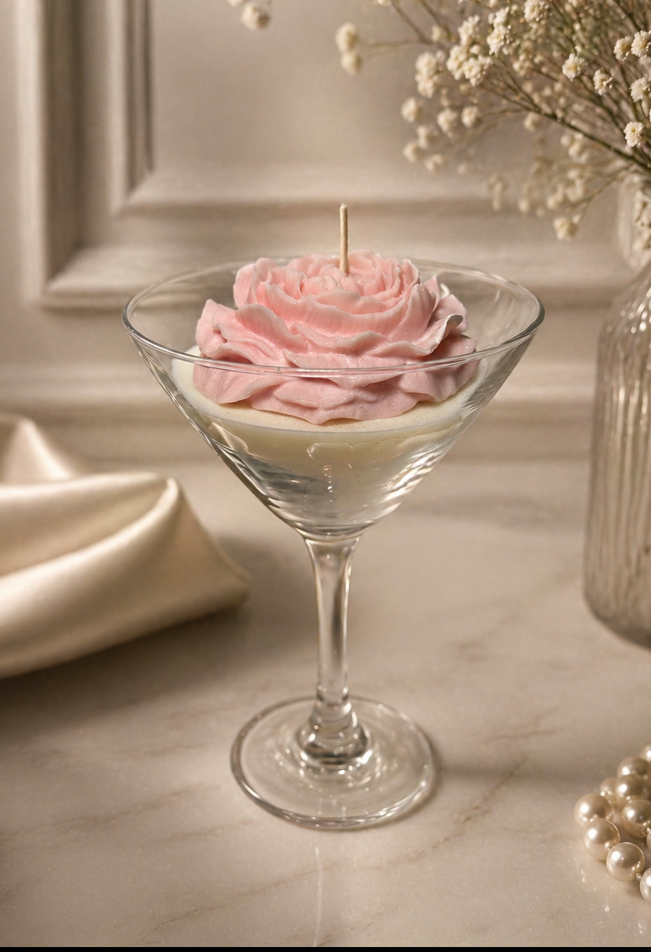 Blush rose candle in a coupe glass