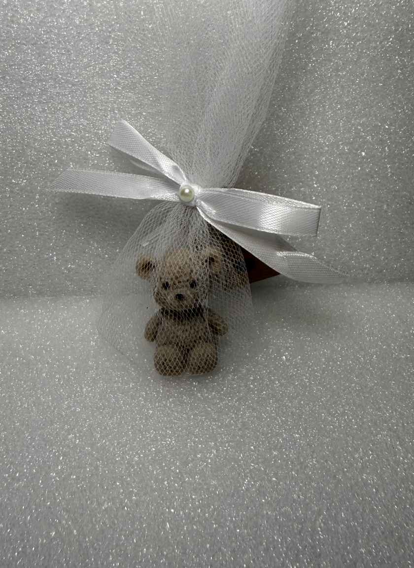 Teddy bear favor candle styled in a cozy review photo
